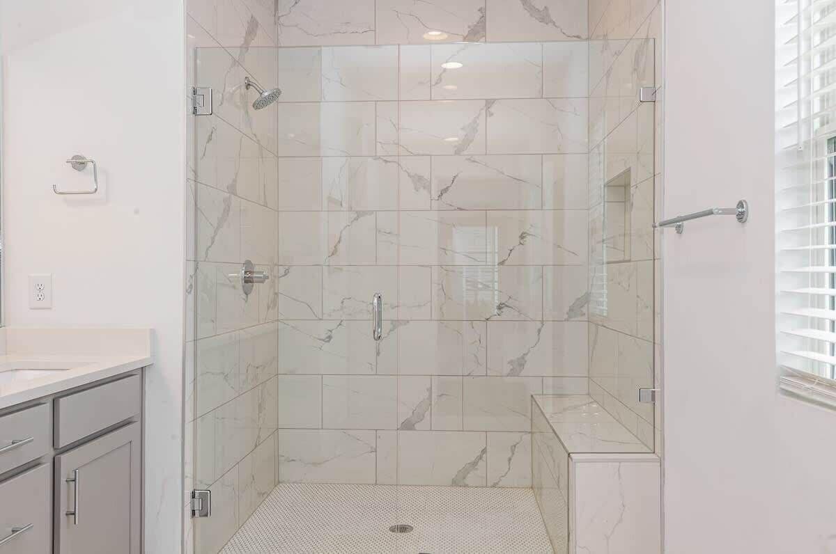 Shower, hair dryer, towels, shampoo