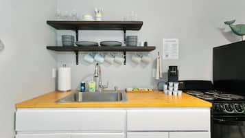 Fridge, cookware/dishes/utensils, dining tables