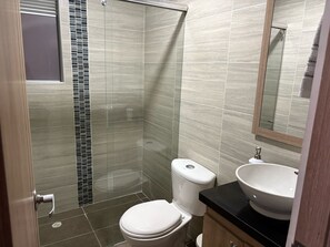 Hair dryer, towels, soap, shampoo
