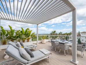 Outdoor dining - Newly Built 3 BDRM Lavish Beachside Penthouse (Marbella)