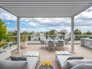 Outdoor dining - Newly Built 3 BDRM Lavish Beachside Penthouse (Marbella)