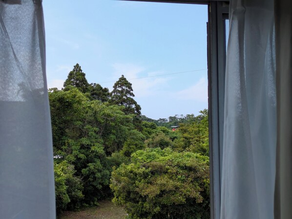 Quarto casal família, varanda coberta | Vista do quarto