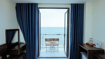 Deluxe Double Room, Balcony, Sea View | 1 bedroom, in-room safe, free WiFi