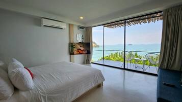 Deluxe kamer, 1 twee- of 2 eenpersoonsbedden, uitzicht op zee | Een minibar, een kluis op de kamer, gratis wifi, beddengoed