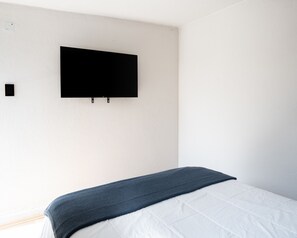 1 chambre, fer et planche à repasser, Wi-Fi gratuit, draps fournis