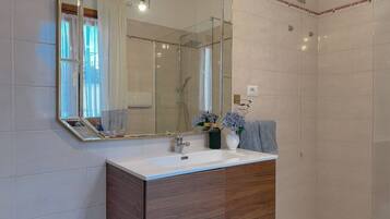 Hair dryer, bidet, towels, soap