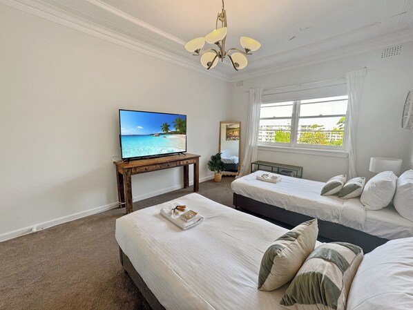 2 habitaciones, tabla de planchar con plancha y wifi gratis 