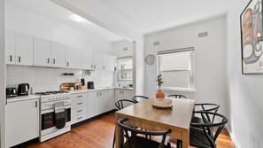 Coffee/tea maker, fridge, microwave, oven