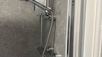 Shower, towels, soap, shampoo