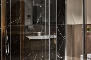 Shower, eco-friendly toiletries, hair dryer, towels