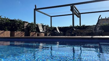 Outdoor pool, open 8:00 AM to 8:00 PM, sun loungers
