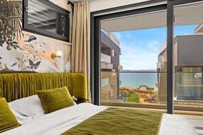 2 bedrooms, in-room safe, iron/ironing board, travel cot