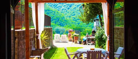 Furniture, Outdoor Furniture, Outdoor Table, Eco Hotel, Shade, Chair, Porch, Wood Stain, Backyard, Flowerpot