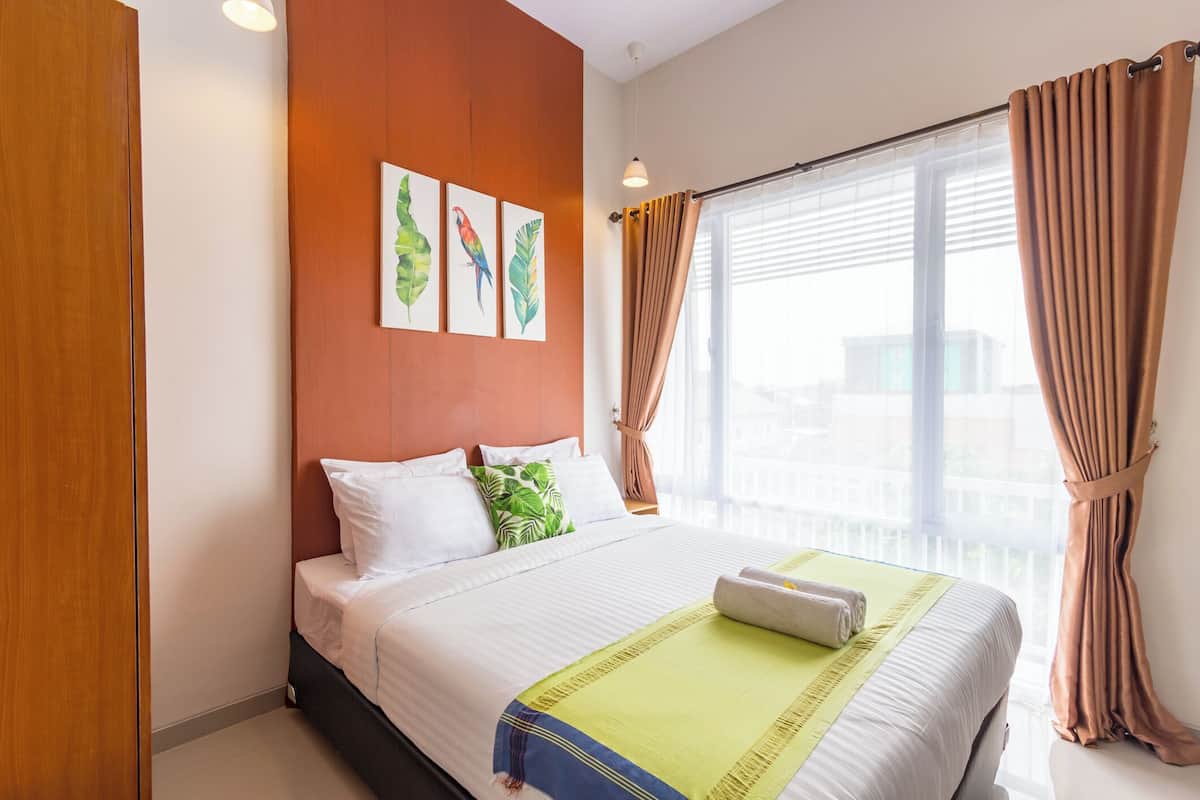 Doppia Deluxe, 1 letto queen, vista città | Una cassaforte in camera, Wi-Fi gratuito