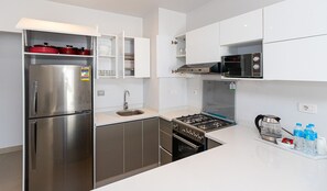 Chalet, 3 Bedrooms, Balcony, Garden View | Private kitchen | Fridge, microwave, oven, cookware/dishes/utensils