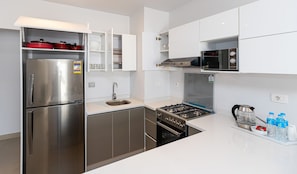 Chalet, 3 Bedrooms, Balcony, Garden View | Private kitchen | Fridge, microwave, oven, cookware/dishes/utensils