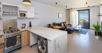 Chalet, 2 Bedrooms, Balcony | Living area | Flat-screen TV