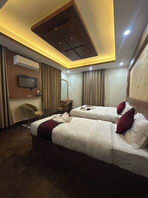 Deluxe Double or Twin Room, Multiple Beds, Non Smoking, Private Bathroom | 1 bedroom, desk, laptop workspace, free WiFi