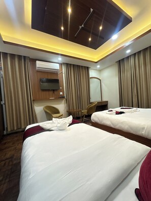 Deluxe Double or Twin Room, Multiple Beds, Non Smoking, Private Bathroom | 1 bedroom, desk, laptop workspace, free WiFi