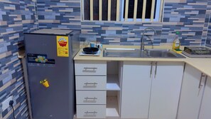 Fridge, microwave, stovetop, electric kettle