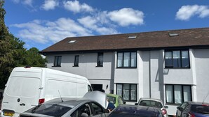 A two-story building with a flat roof and multiple windows. - 526A Farnham Rd  (Slough)