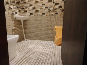 Standard Double Room, City View | Bathroom | Shower, free toiletries, slippers, towels