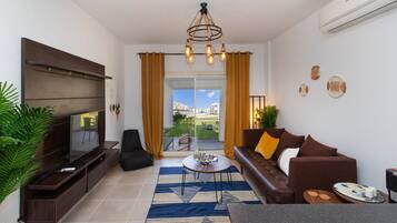 Chalet, 2 slaapkamers, balkon, uitzicht op tuin | Woonruimte