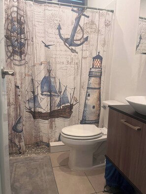 Shower, towels, toilet paper