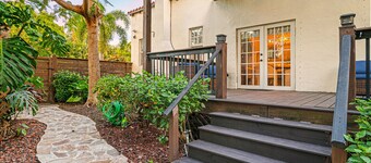 A Spanish-inspired oasis featuring a private heated pool and a separate guest suite. Just 10 minutes from Downtown West Palm Beach, it blends tropical serenity with modern comfort—perfect for families, groups, or multi-generational stays.