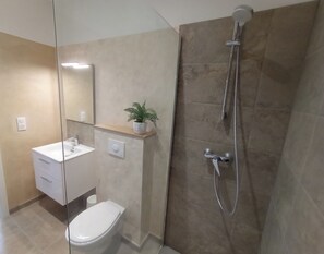 Habitación doble Confort, 1 cama Queen size, vista al mar | Baño