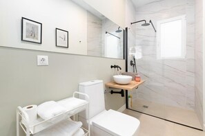 Shower, hair dryer, towels, soap