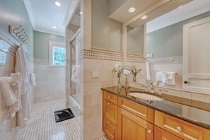Shower, hair dryer, towels