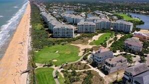 A coastal resort with beachfront properties, golf course, and water bodies. - 3rd floor ocean views from Cinnamon Beach 235! (Palm Coast)