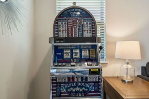 A slot machine with a 'TRIPLE DOUBLE STARS' theme, a collection ticket slot, and a 'PAYLINE' indicator.