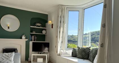 Coastal Escape: River Views, Terrace & Parking