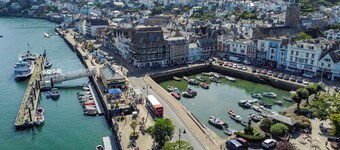 Coastal Escape: River Views, Terrace & Parking