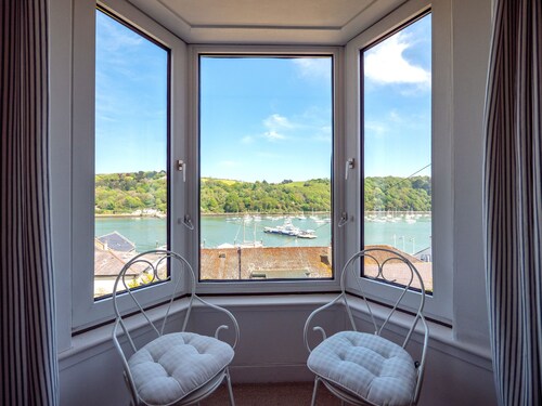 Coastal Escape: River Views, Terrace & Parking