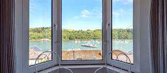 Coastal Escape: River Views, Terrace & Parking