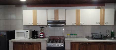 Fridge, microwave, coffee/tea maker, blender