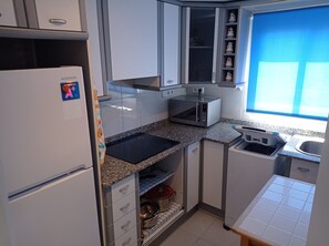 Fridge, microwave, coffee/tea maker, toaster