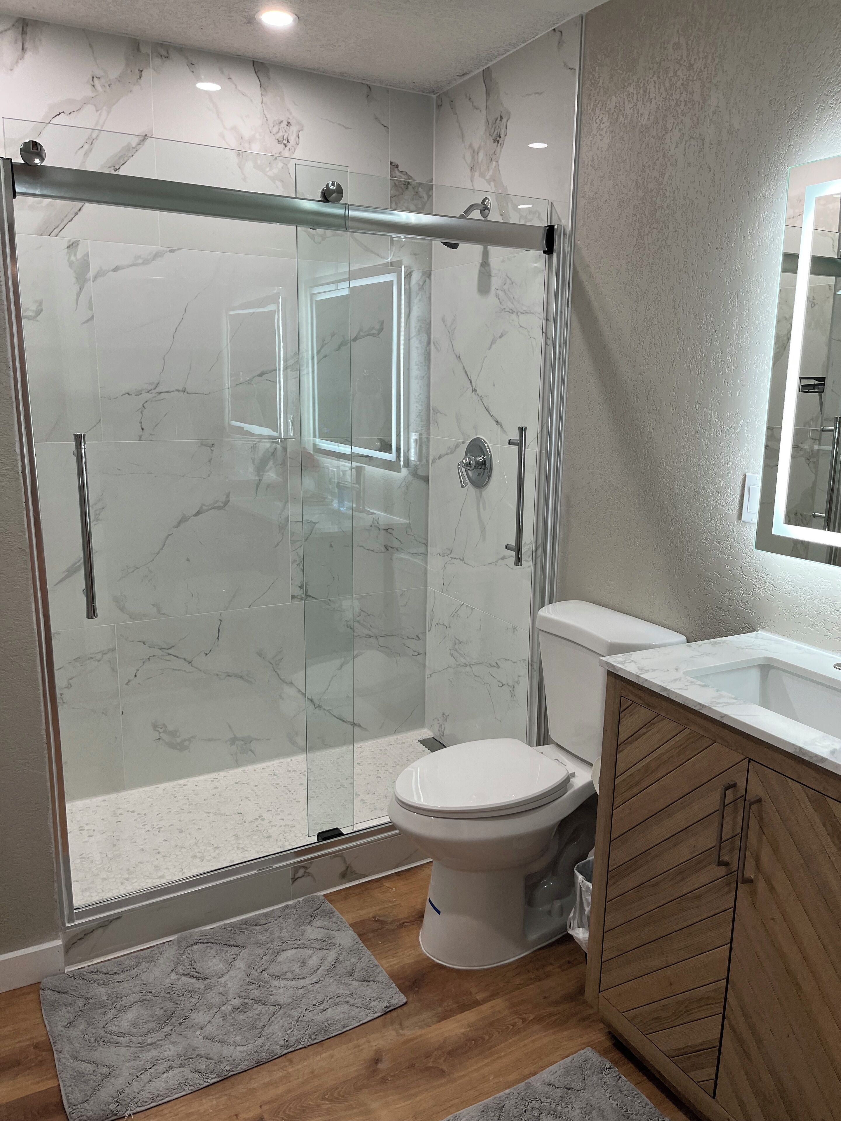 Shower, towels, toilet paper