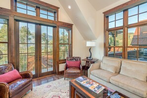 Smart TV, fireplace, books, printers