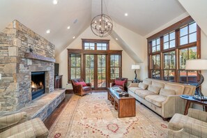 Smart TV, fireplace, books, printers