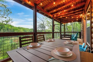 Outdoor dining - Epic Smoky Mountain Escape: Hot Tub, Arcade, Huge Decks & Views! (Sevierville)
