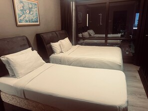2 dormitorios, tabla de planchar con plancha, wifi y ropa de cama