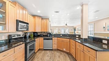 Townhome, Multiple Beds, Patio, Garden View (5808 Beach Drive A) | Private kitchen | Fridge, microwave, oven, stovetop