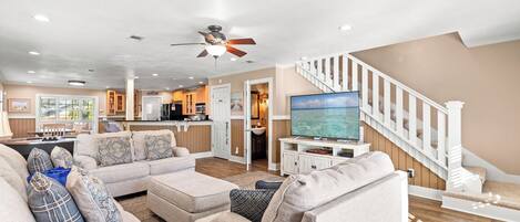 Townhome, Multiple Beds, Patio, Garden View (5808 Beach Drive A) | Living area | 42-inch flat-screen TV with digital channels