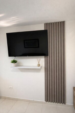 Apartamento superior | Ferros/tábuas de passar roupa, Wi-Fi de cortesia