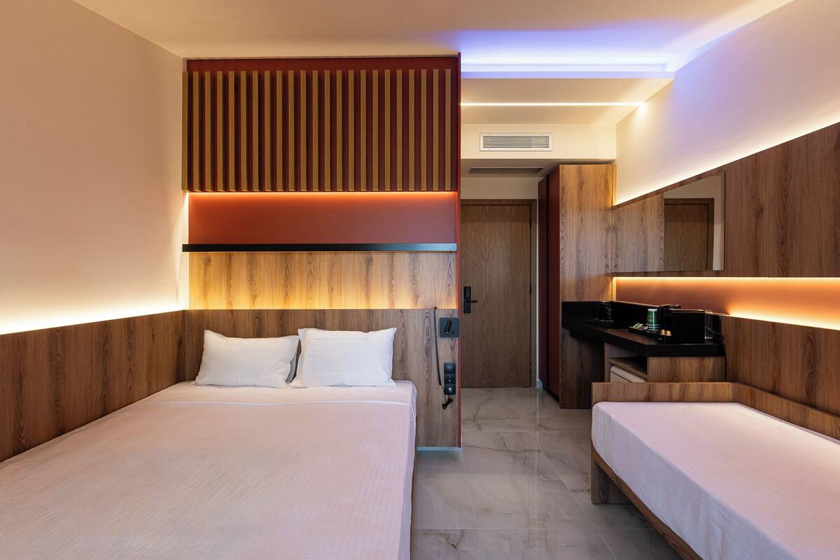 Chambre Triple, vue mer