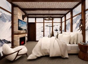 A room with a fireplace, a sofa, a chair, and a large window with a mountain view. - Voyage Grand 14 BD/ 15.5 BA/ Paradiso Grande (6091 HS) (Orlando)